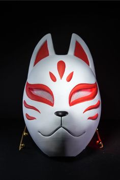 "Kitsune" translates to "Fox". In Japanese culture, the fox is known to have contradictory behavior. Which means it can be benevolent (good) or malevolent (evil), depending on the situation. Unveil the mystique of ancient legends and modern creativity with our meticulously crafted 3D Printed Kitsune Mask. This masterpiece effortlessly fuses cultural allure and imaginative flair, offering a captivating accessory that resonates with anime, cosplay, and beyond. Key Features: 🦊 Cultural Fusion: The Kitsune Mask seamlessly bridges traditional aesthetics with fantastical allure, allowing you to embrace both cultural significance and creative expression. 🌟 Artistic Embroidery: Embellished with intricate details and embroidery, this mask showcases exquisite craftsmanship that brings the mystique Japanese Fox Spirit, Kitsune Fox Spirit, Japanese Fox Mask, 3d Printed Mask, Japanese Fox, Kitsune Mask, Kitsune Fox, Japanese Mythology, Fox Spirit