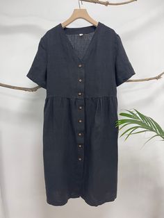 "This linen midi dress is a perfect example of beauty in simplicity. Made from breathable and soft linen, just right below the knee length, back tie at the neck line, this classic piece is such a no-brainer go to item. - Handmade with 100% medium weight linen - Short sleeves - Scoop neck - Button down front - Below the knee length or customized length per request Please provide your shoulder width, full bust measurement ( measured around the fullest part ) and your height in the note to seller b Linen Midi Dress With Buttons, Beach Shirt Dress With Short Sleeves, Summer Linen Midi Dress With Button Closure, Summer Midi Linen Dress With Button Closure, Short Sleeve Maxi Dress With Buttons For Summer, Summer Maxi Dress With Short Sleeves And Buttons, Summer Maxi Dress With Buttons And Short Sleeves, Summer Linen Maxi Dress With Button Closure, Linen Maxi Dress With Button Closure For Summer