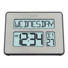 an alarm clock with the words wednesday on it