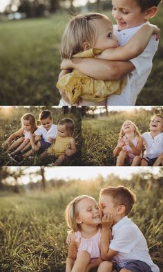 two young children are hugging each other in the grass and one is holding another child