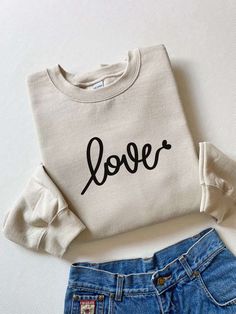 The Love Sweatshirt is the perfect way to celebrate your love and express your affection this Valentine’s Day. This unique and stylish Couple Sweater is not only a fashionable statement piece but also a meaningful gift for your beloved that will warm their heart and keep them cozy. Designed with meticulous attention to detail, this Valentine’s Day Sweatshirt features a soft and comfortable fabric blend that ensures ultimate comfort. The premium quality material is gentle on the skin, Cricut Sweatshirt Ideas Women Trendy, Cricut Sweatshirt Ideas Women, Cricut Sweatshirt, Cricut Sweatshirt Ideas, Sports Parent, Valentines Sweatshirt, Valentines Day Sweatshirt, Couples Sweaters, Love Sweatshirt