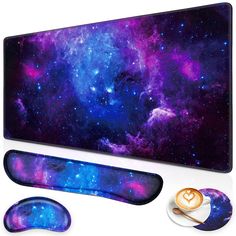 a computer mouse pad and keyboard with space in the background