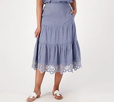 Think of it as a fancy cousin to regular cotton. You can still count on it being comfortable and cool, but this cotton lawn skirt has a crisp finish with a bit more structure. Its relaxed fit, tiered panels, and embroidered hemline means there's lots of opportunity for testing out a few stolen twirls (and turning heads). Have fun! From Isaac Mizrahi Live!TM. Tall Skirt, Suede Pencil Skirt, Western Skirts, Embroidered Hem, Floral Pleated Skirt, Knit Maxi Skirt, Metallic Skirt, Leather Midi Skirt, Petite Skirt