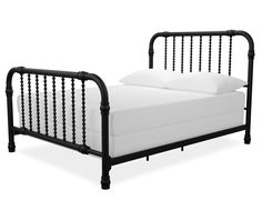 a black metal bed frame with white sheets and pillows on the headboard, in front of a white background