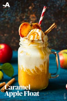 caramel apple float in a mason jar with cinnamon sticks and apples on the side