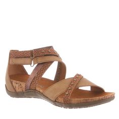 Give your Summer style a little lift in the Julianna II Sandal. Swooping stamped faux leather cross-straps provide a stylish flair and custom fit with adjustable hook and loop strap closure and enhanced stud details. Tonal floral details accent the microsuede topcover and the cork wrapped cushioned EVA midsole and sculpted TPR outsole provide comfort and traction. Womens Strappy Sandals, Leather Stamps, Footbed Sandals, Rubber Shoes, Wardrobe Ideas, Round Toe Heels, Bearpaw Boots, Womens Clogs, Toe Sandals