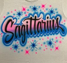 a white tank top with the word sagittatis painted on it