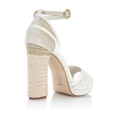 Description
Sizing / Details
Shipping / Return



BOHO SANDAL IN WHITE VELVET WITH HERRINGBONE TEXTURE, SATIN AND BRAIDED HEEL

 Our new Spiga Bianco sandal introduces us for the first time to this velvet texture with a herringbone effect, providing a boho air thanks to the combination of satin with velvet in neutral tones and its braided heel. Spiga Bianco plays with different materials and textures such as velvet, satin and braided heels, creating a harmonious whole.

Due to its fresh combina Summer White Fitted Heels, White Fitted Heels For Summer, Fitted White Summer Heels, Luxury White Heels For Beach, Luxury White Beach Heels, Luxury White Sandals With Heel Strap, Luxury White High Heel Sandals, White Fitted Sandals With Heel Strap, White Heels With Heel Strap For Summer