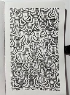 a piece of paper with black and white designs on it