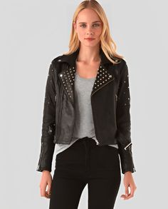 Women's Studded Biker Leather Jacket In Black Studded Leather Jacket For Biker Events In Fall, Rock Style Studded Leather Jacket For Winter, Winter Rock Style Leather Jacket With Studs, Winter Leather Studded Biker Jacket, Studded Biker Leather Jacket, Studded Leather Biker Jacket For Winter, Edgy Studded Biker Jacket For Winter, Winter Leather Biker Jacket With Studs, Winter Biker Leather Jacket With Studs