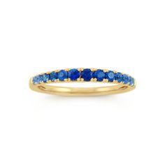 This stylish ombre ring features natural gemstones and makes a gorgeous addition to any jewelry collection. It’s crafted in warm 14-karat yellow gold with blue sapphires that increase in size and darken in shade as they reach the center of the ring. Multi-stone Sapphire Ring In Yellow Gold, Yellow Gold Stackable Sapphire Ring, Yellow Gold Sapphire Birthstone Ring In Fine Jewelry Style, 14k Gold Sapphire Half Eternity Ring, Yellow Gold Sapphire Stackable Rings With Round Cut, Blue Multi-stone Sapphire Ring In 14k Gold, Fine Jewelry Yellow Gold Sapphire Ring With Accent Stones, Yellow Gold Sapphire Rings With Multi-stone, Yellow Gold Sapphire Stackable Rings With Gemstone