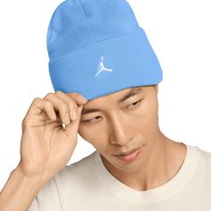 A fitted beanie with a generous cuff and embroidered Jumpman at front. Fit & Design Fitted beanie Made from soft, warming knit yarn Lined for comfort and durability Large fold-over cuff Embroidered Jumpman at center front Additional Details Hand wash only Club Fits, Newest Jordans, Military Discounts, Textured Knit, Nike Jordan, Knitting Yarn, Brand You, Stay Warm, Cold Weather