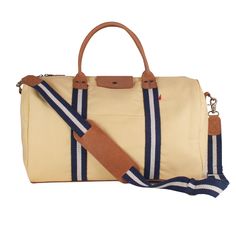 This duffle is a perfect size to bring as a carry-one or in addition to your other bags. There's a handy trolly slip on the back so it slips easily over your rollie-bag handles. With a full leather bottom and details, this bag will add some style back to your travels! Matching travel kits also available. (The Natural bag has black /natural striped webbing). This item can also be monogrammed!Product Overview: Dimensions: 18" x 10" x 10" with a 6" handle drop, 55" adjustable / detachable strap Hea Travel Kits, Pocket Mirror, Monogrammed Items, Bag Handle, Real Leather, The Well, Cotton Canvas, Shoulder Strap, Slip On