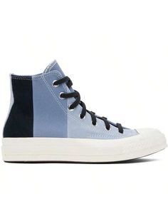 Converse 
Blue & Navy Chuck 70 Patchwork Suede High Top Sneakers 
High-top paneled canvas and suede sneakers in tones of blue and navy. 
. Rubber cap toe 
. Lace-up closure 
. Logo patch and eyelets at inner side 
. Cushioned Ortholite® footbed 
. Canvas lining 
. Rubberized logo patch at midsole 
. Treaded rubber sole 
. Contrast stitching in white 
Supplier color: Rainy daze/Thunder daze/Black 
Upper: leather, textile. Sole: rubber. 
Made in Viet Nam. 
241799M236061 
Blue & Navy Chuck 70 Patch Navy Chuck 70, Casual Athletic Shoes, Men Sneakers, Chuck 70, Suede Sneakers, Outdoor Shoes, Contrast Stitch, High Top, Patch Logo