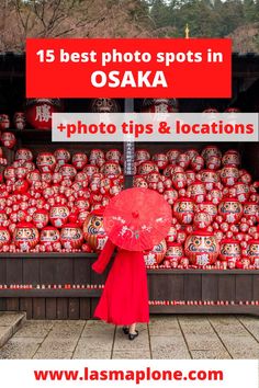 a woman holding an umbrella in front of a display of red vases with the words best photo spots in osak