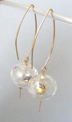 Gold Glass Earrings With Dangling Beads, Gold Wire Wrapped Glass Earrings, Party Earrings With Dangling Glass Beads, Elegant Round Glass Earrings, Elegant Glass Beaded Drop Earrings, Gold Glass Jewelry With Dangling Beads, Minimalist Gold Earrings With Dangling Beads, Unique Gold Glass Earrings, Gold Dangling Beads Round Earrings