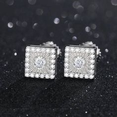 Add a dash of sparkling elegance to your look with these exquisite Round Moissanite Diamond Square Shaped Stud Earrings from Evani Naomi Jewelry. Displaying a stunning round cut stones and a unique square-shaped setting, these fine jewels are a testament to style and sophistication. They're crafted with high-quality materials, combining 92.5% pure silver with 7.5% hypoallergenic metals, then dipped generously in 18k gold five times over to ensure durability while maintaining an appealing shine. Diamond Earrings Men, Blood Diamonds, Earrings Men, Square Stud Earrings, Blood Diamond, Traditional Diamond, Cvd Diamond, Classic Engagement Rings, Square Earrings Studs