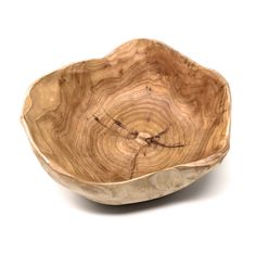 a wooden bowl is shown on a white background