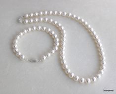 This is the perfect pearl jewelry set for your vintage inspired wedding and special occasion event. Whether you are walking down the aisle or attending an event, this pearl jewelry set is the most perfect accessory.  Pearls never go out of style. Jewelry set comes with necklace and bracelet. Shown in the listing it's the set with 8mm white pearls. I can make this set with most any pearl size from 3mm to 8mm. I have finished off with a fish hook sterling silver clasp. Clasp design features a brush-finished with a tiny rhinestone in the middle. It has french wire at the ends to protect the wire. Crimps are sterling silver. Perfect for a classy bride and any special occasion! Please choose pearl color and length at checkout. I'm happy to extend the bracelet up to 8 1/2" without extra charge i Classic White Pearl Bracelet For Wedding, Classic Pearl Bracelet For Wedding, Classic Wedding Pearl Bracelet, Classic Pearl Bridal Necklace For Mother Of The Bride, Classic White Pearl Necklace For Mother Of The Bride, Classic White Pearl Necklace For Weddings, Classic Pearl White Necklace For Mother Of The Bride, Classic White Bridal Necklace For Mother Of The Bride, Classy Bride