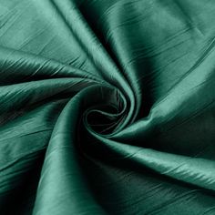 a green satin fabric that is very soft