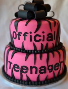 a pink and black cake with the words official teenager on it's top tier