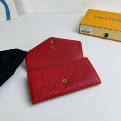 The envelope style Sarah Wallet features a meticulously embossed Monogram Empreinte leather exterior and a cleverly designed interior with numerous pockets and credit card slots. 

Size: 19×10.5×2.5cm Designer Envelope Wallet With Interior Card Slots, Designer Red Wallet With Interior Card Slots, Luxury Red Wallets With Interior Card Slots, Designer Red Wallets With Interior Card Slots, Louis Vuitton Yayoi Kusama, Louis Vuitton Capucines, Large Cosmetic Bag, Lv Purse, Lv Shoes