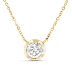 Always just the right look, this classic diamond necklace is the start of something beautiful. Crafted in 14K gold, this sparkling style showcases a 1 ct. diamond solitaire boasting a color rank of I and clarity of SI2 - in a sleek bezel setting. Buffed to a brilliant luster, this dazzling design sits centered along an 18.0-inch cable chain that secures with a lobster claw clasp. Classic Solitaire Necklace With Bezel Setting, 14k Gold Solitaire Necklace With Round Cut, Gold Solitaire Necklace With Lab Grown Diamond For Anniversary, Timeless Yellow Gold Solitaire Necklace With Round Cut, Yellow Gold Diamond Solitaire Necklace With Brilliant Cut, Yellow Gold Solitaire Necklace With Brilliant Cut Diamond, Classic Round Cut Diamond Necklace With Bezel Setting, Brilliant Cut Diamond Solitaire Necklace In Yellow Gold, Timeless Solitaire Necklace With Bezel Setting For Formal Occasions