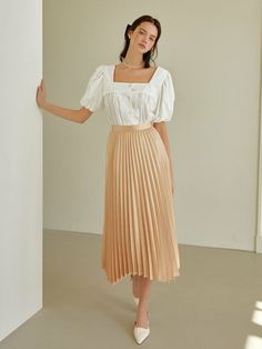 Editor's Notes Classy and casual design style long pleated skirt that has a feminine wear. It has a comfortable wear with a stylish fit that is great to style in many different ways.- Feminine mood pleats skirt- Polished detail wear that has a luxurious wear- Unbalanced hem design style- Slim comfortable fit when worn Measurements(in.)S / M- Waist: 12.99 in. / 13.98 in. - Hip: 21.06 in. / 21.26 in- Total Length: 31.10 in. - 34 Long Pleated Skirt, Pleats Skirt, Pleated Long Skirt, Casual Design, Design Style, Long Skirt, Pleated Skirt, Comfort Fit, Skirt