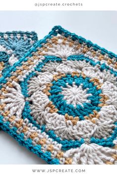 two crocheted coasters sitting on top of each other