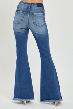 Enhance your wardrobe with these trendy and stylish RISEN High Rise Front Slit Frayed Hem Flare Jeans. The high-rise design flatters and elongates your legs, while the front slit adds an edgy touch. The frayed hem and flared silhouette create a cool, retro look perfect for casual outings. Pair with a blouse or crop top for a chic ensemble. How to figure out your best fit Risen jean sizing We mark our Risen jeans as true to size because they are very close to our US size guide. If you prefer your Romper Dress, Cropped Top, Plus Size Tops, Bell Bottom Jeans, Flare Jeans, Plus Size Dresses, Outfit Sets, Jumpsuit Dress, Knit Top