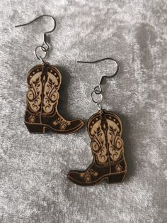 These super fun country and western inspired earrings will make a great addition to your wardrobe. Made from wood, these novelty earrings are unique and different. Earrings come mounted onto seeded earring cards. So simply rip up, plant and watch the flowers grow! An extra little gift that will keep on giving. Western Style Earrings For Gifts, Handmade Western Dangle Earrings, Cowgirl Earrings, Cowboy Accessories, Earrings Western, Country Cowboy, Novelty Earrings, Country And Western, Earring Cards