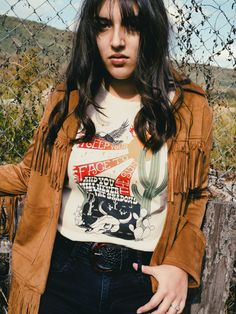 vintage desert shirt womens 70s graphic tees southwestern eagle arizona tshirt 70s shirt southwest tee sunburst flames shirt Our Face to The Sun tee invokes the lure of the hot dusty desert. With its edgy western vibes, this Rabbit and The Raven exclusive in-house design was made for all the stargazing desert-wanderers. Size Guide: Our 100% cotton Face To The Sun tee comes in a Unisex style on Soft Cream. Please refer to the provided tee measurements given in the listing images. It is advisable Western Style Relaxed Fit Graphic T-shirt, Western Style Relaxed Fit T-shirt With Graphic Print, Trendy Fall Festival T-shirt, Fitted Western Style T-shirt For Summer, Fall Festival Graphic Print T-shirt, Western Pre-shrunk Tops For Summer, Bohemian Style T-shirt For Fall Festival, Bohemian Fall Festival T-shirt, Vintage T-shirt For Fall Festival