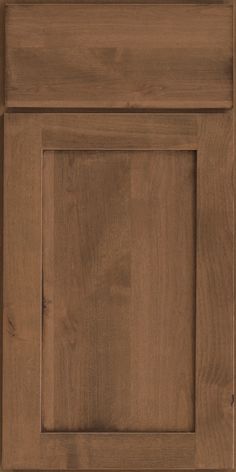 a close up view of a wooden cabinet door