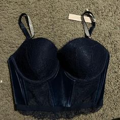 This Is A Lightly Lined Navy Blue Lace And Velvet Top With The Shine Straps In A 36d Elegant Blue Bra With Adjustable Straps, Blue Sleeveless Evening Corset, Blue Sleeveless Corset With Straps, Elegant Fitted Blue Bra, Blue Corset With Straps, Blue Fitted Tops With Underwire Support, Elegant Victoria's Secret Bra-friendly Tops, Victoria's Secret Fitted Strapless Bra, Elegant Victoria's Secret Bra Friendly Tops