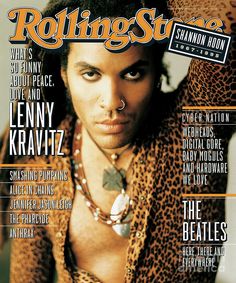 the cover of rolling stone magazine, featuring person on the cover with his shirt off