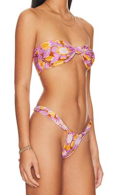 Get ready for a day of soaking up the sun in our Floral Print Bikini Suit! This bikini features a stunning floral print that's perfect for adding a pop of color to your swimwear collection. Order now and be the envy of the beach! Colour may vary due to lighting on images. The product images (without model) are closest to the true colour of the product.Item runs true to size chart and is cut to suit our size chart. Please refer to our size chart for the best fit. Do not size up or down. Colorful Floral Print Beachwear Swimwear, Festival Floral Print Swimwear Beachwear, Tropical Multicolor Floral Print Swimwear, Vibrant Multicolor Floral Print Swimwear, Sports Swimsuits, Floral Print Stretch Swimwear With Tie-side Bottom, Floral Print Design, Plus Size Shopping, Weekend Wear