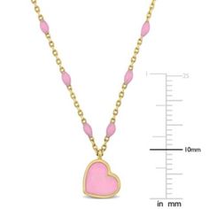 Elevate your style with the enchanting beauty of this 14K yellow gold pink enamel heart necklace. The delicate chain showcases a charming heart-shaped pendant adorned with a lovely pink enamel finish. The playful design adds a touch of romance and femininity to any outfit. With a length of 16 inches and a 2-inch extender, you can easily adjust the necklace to achieve the perfect fit. Crafted from 14K yellow gold, this necklace exudes a luxurious and radiant shine. The spring ring clasp ensures secure and effortless wear. Whether worn alone as a graceful statement piece or layered with other necklaces for a trendy look, this pink enamel heart necklace is a captivating accessory that will steal hearts wherever you go. | Belk & Co Pink Enamel Heart Necklace in 14K Yellow Gold Dainty Pink Heart Necklace For Valentine's Day, Pink Cable Chain Necklace As Gift, Pink Heart Shaped Jewelry With Delicate Chain, Pink Dainty Heart Necklace With Adjustable Chain, Pink Cable Chain Necklace Gift, Pink Dainty Heart Pendant Charm Necklace, Pink 14k Gold Heart Jewelry, Pink Cable Chain Necklace For Gift, Valentine's Day Pink Necklace With Delicate Chain