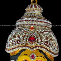 Design by Classical Dance Jewelry® ❥ Product Details: Designer Goddess Varalakshmi Ammavaru Face ❥ Material is mixed Alloys ❥ Color: Yellow and Gold ❥ Beautiful Goddess Lakshmi face set used for varalakshmi Vratham ❥ Beautifully decorated mask used for pooja during Varalakshmi Vratham ❥ Completely Decorated with High Quality Stones and pearls 🎈We will send item that are in stock close to the sample picture.🎈 ❥❥❥❥ Height of face : 7 - 8 Inchs ❥❥❥❥ Set includes ☛ Lakshmi Face : 1 ❇️ Ammavaru Fac Festival Celebration Tikka With Cutdana, Red Tikka For Navratri, Red Tikka For Puja And Festivals, Red Bollywood Tikka For Navratri, Navratri Celebration Tikka With Cutdana, Red Ceremonial Tikka For Diwali, Red Tikka For Festivals, Festive Red Tikka With Cutdana, Red Traditional Wear With Latkans For Festivals