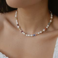 This Millefiori Pearl Necklace is a timeless piece suitable for any season to add a pop of color and fun to your outfit. Each necklace is beaded in a unique pattern, which means each necklace is different from the others, this delicate design makes it perfect for an effortless look. DETAILS:Water Resistant - Allergy-free18k Goldplated Stainless Steel Clasps, Ivory Freshwater Pearls, Millefiori Glass BeadsGold-filled seed beadsONE SIZE 16.5 inches NOTE: All designs are unique, photos are for refe Chunky Glass Bead Necklace, Pearl Necklace Designs Unique, Millefiori Jewellery, Summer Glowup, Best Jewellery Design, Ocean Ecosystem, Natural Pearl Necklace, Capsule Closet, Unique Photos