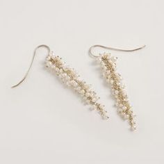 Stay stuck in time with our Delicate Gold Pearl Drops, handcrafted from the tiniest of feminine seed pearls and beautiful 18ct gold plated sterling silver.  These lightweight earrings are the perfect statement designer wedding jewellery - for the modern bride or lover of pearl jewellery. More Details Stay stuck in time with our Delicate Gold Pearl Drops, handcrafted from the tiniest of feminine seed pearls and beautiful 22ct gold vermeil plated sterling silver. These lightweight earrings are the Designer Wedding Jewelry, Classic Pearl Jewelry, Pearl Clutch Bag, Designer Wedding Shoes, Rose Shoes, Bridal Jewelry Collection, Pearl Bag, The Modern Bride, Pearl Jewellery