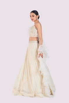 Stylish ivory embroidered designer net lehenga is perfect for weddings. It comes with a net dupatta. Shop online from Pure Elegance. Disclaimer: The actual product may vary slightly from the image. These are custom orders, hence expect slight variation in color and placement of the motif or buta. ESTIMATED DELIVERYBecause this is a custom order, it would take about 4 weeks from the date of purchase. RETURN POLICYThis product is a custom order and cannot be returned or exchanged. Lehenga With Dupatta, Sharara Suits, Lehenga Online, Net Lehenga, Fashion Journals, Pure Elegance, Traditional Fabric, Anarkali Suit, Net Dupatta