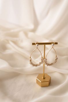 If you're looking for a classic pearl drop statement for your big day, look no further. Our Iris Bridal Collection earrings will give you a comfortable wear while you're celebrating all day/night with your family + friends. The Iris is a pearl wrapped 14k gold-filled oval hoop connected to a pearl stud post. Oval Pearl Charm Earrings For Wedding, 14k Gold Filled Teardrop Pearl Earrings For Anniversary, Teardrop 14k Gold Filled Pearl Earrings For Anniversary, Teardrop 14k Gold-filled Pearl Earrings For Anniversary, 14k Gold Filled Pearl Earrings For Wedding, 14k Gold Filled Teardrop Wedding Earrings, Celebration Teardrop Pearl Drop Earrings, Wedding Yellow Gold Oval Pearl Earrings, Teardrop Pearl Earrings For Celebration