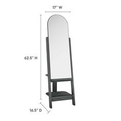 a tall mirror sitting on top of a wooden stand