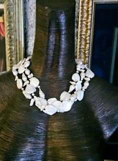 Here's an ornate vintage freshwater pearl necklace that has never been worn. I found this while organizing my jewelry and decided it was time to let someone else share the joy. Three strands of white to off-white freshwater pearls are individually knotted in this non-adjustable 19" necklace. The nacre is pristine as are the beads. This closes with an ornate carved flower abalone box clasp. Would be great for black tie, bridal or wedding venues, but it also is appropriate for business or professi Rocker Chic Accessories, Shell Choker, Unique Pendant Necklace, Statement Bib Necklace, Mermaid Necklace, Freshwater Pearl Necklace, Box Clasp, White Freshwater Pearl, Statement Pendant