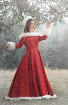 This Mrs Claus dress is made of brocarde fabric with small silver dots. The neckline and trim lines are outlined by white fake fur. The dress comes with an under skirt petticoat with crinoline The dress closes in the back with a zipper. This outfit will make you an outstanding, looking Lady Claus. This is custom-made to clients measurements and I require 2 weeks to finish it. Please contact me for further assistance to discuss measurements and how to purchase a made to order outfit. I will be ha Vintage Christmas Dress Women, Traditional Christmas Outfits, Christmas Fashion Outfits 2023, Christmas Dress White, Mrs Clause Costume For Women, Red Satin Christmas Dress, Modern Mrs Claus Outfit, Ms Clause Outfit, Santa Claus Outfit Woman