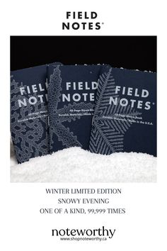 three field notes sitting in the snow with text that reads, winter limited edition snowy evening one of a kind 989 times