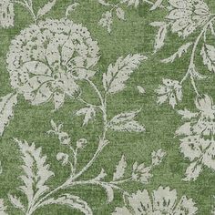 a green and white floral pattern on fabric