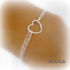 Welcome simple heart bracelet... details: sterling silver cable chain and clasps sterling silver heart measures 10mm from side to side please select desired length at checkout! Custom Orders Welcome! Sterling Silver Double Heart Bracelet, Sterling Silver Double Heart Bracelet Gift, Minimalist Sterling Silver Heart Bracelet For Mother's Day, Silver Minimalist Heart Bracelet For Valentine's Day, Minimalist Silver Heart Bracelet For Valentine's Day, Sterling Silver Open Heart Bracelet For Mother's Day, Adjustable Delicate Sterling Silver Heart Bracelet, Adjustable Heart Shaped Sterling Silver Bracelet For Valentine's Day, Sterling Silver Heart Charm Bracelet For Wedding