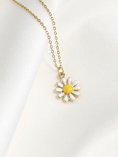 "--NATURE COLLECTION-- This adorable and tiny daisy flower necklace is perfect for casual, special occasions or date night. Makes a great gift for Best Friends, Birthdays, Mother's Day, Wedding, Anniversary or any occasion. Choose between 6 beautiful necklace pendants representing the graceful beauty of nature. 1. Tiny Sparkly Bee (12mm x 12mm) 2. Dainty Butterfly (12mm x 10mm) 3. Golden Dandelion (10mm x 16mm) 4. Golden Cactus (9mm x 18mm) 5. Tiny Daisy (11mm x 11mm) 6. Dainty Monstera (16mm x Dainty Flower-shaped Necklace For Spring, Cheap Daisy-shaped Jewelry For Gift, Dainty Yellow Flower Pendant Jewelry, Dainty Daisy Flower Charm Necklace, Cute Daisy-shaped Jewelry With Flower Charm, Dainty Butterfly, Dainty Hoop Earrings, Daisy Necklace, Necklace Pendants