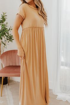 Round Neck Short Sleeve Flowy Maxi Dress Flowy Beige Solid Color Dress, Casual Beige Solid Color Dress, Casual Stretch Brown Maxi Dress, Casual Brown Stretch Maxi Dress, Casual Stretch Beige Midi Dress, Casual Stretch Maxi Dress For Brunch, Casual Brown Maxi Dress For Daywear, Casual Brown Maxi Dress For Brunch, Silhouette Maternity